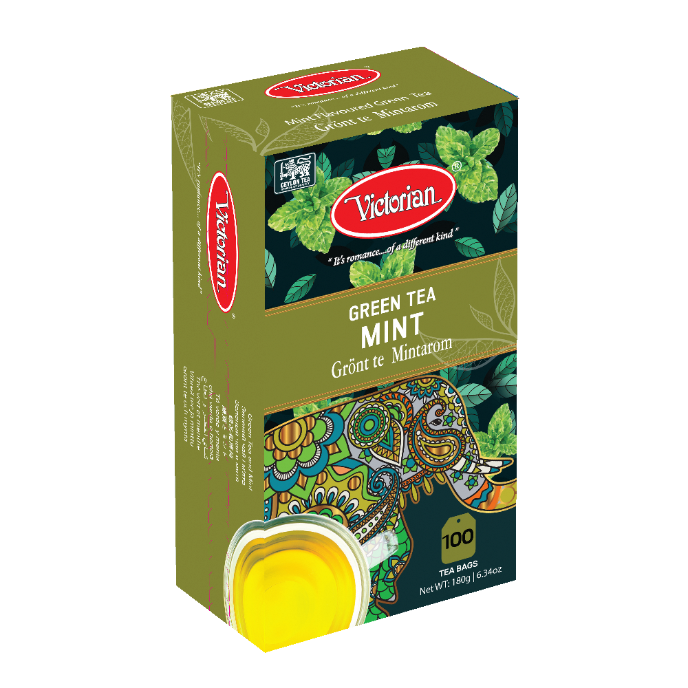 Box of Victorian Green Tea Mint bags, green packaging with mint leaves and colorful decorative design; cup of tea visible at bottom corner.