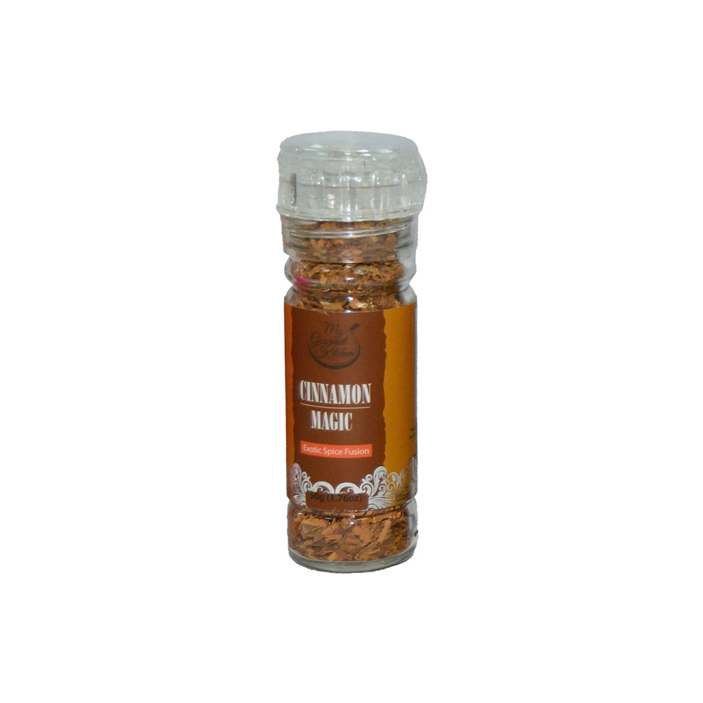Glass spice bottle with cinnamon flakes inside, label reads Cinnamon Magic: Exotic Spice Fusion.