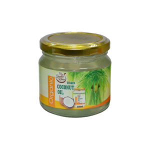 Jar of organic virgin coconut oil with a gold lid and tropical label showing coconuts and palm leaves