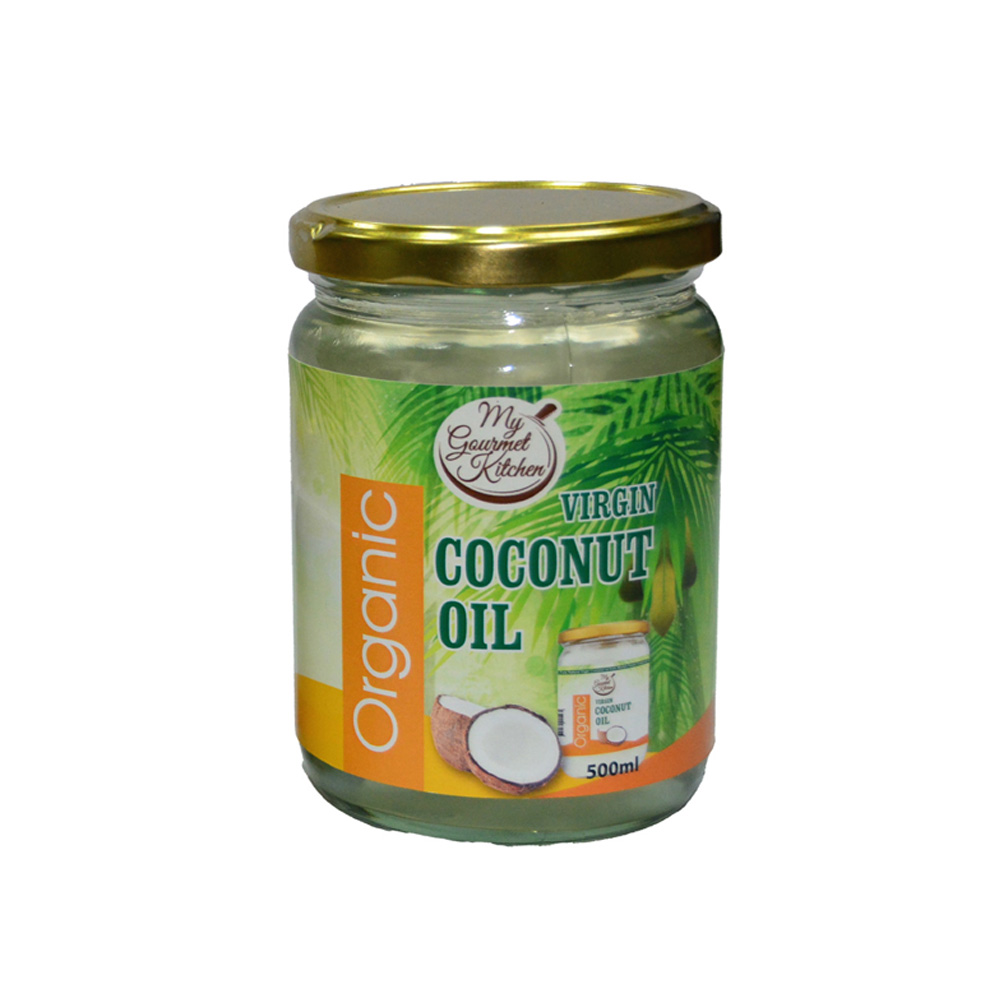 Jar of organic virgin coconut oil with a gold lid and green tropical label indicating 500ml capacity